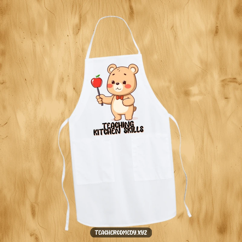 Funny bear character apron, a bear pointing a stick at an apple, adding humor and practicality to kitchen tasks.