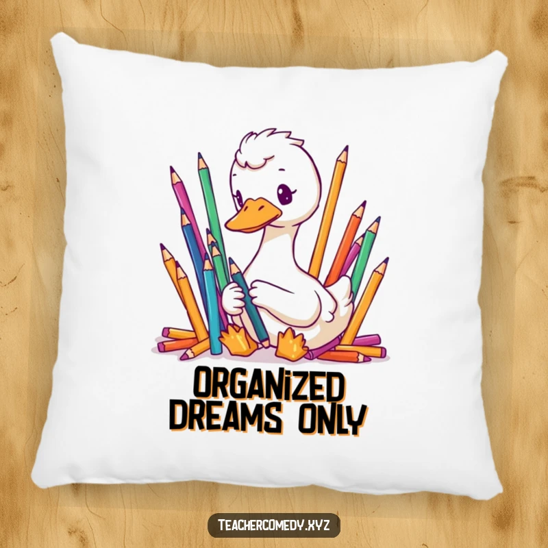 Funny pillow with a focused goose meticulously organizing colorful pencils, offering a soft, humorous touch of order.