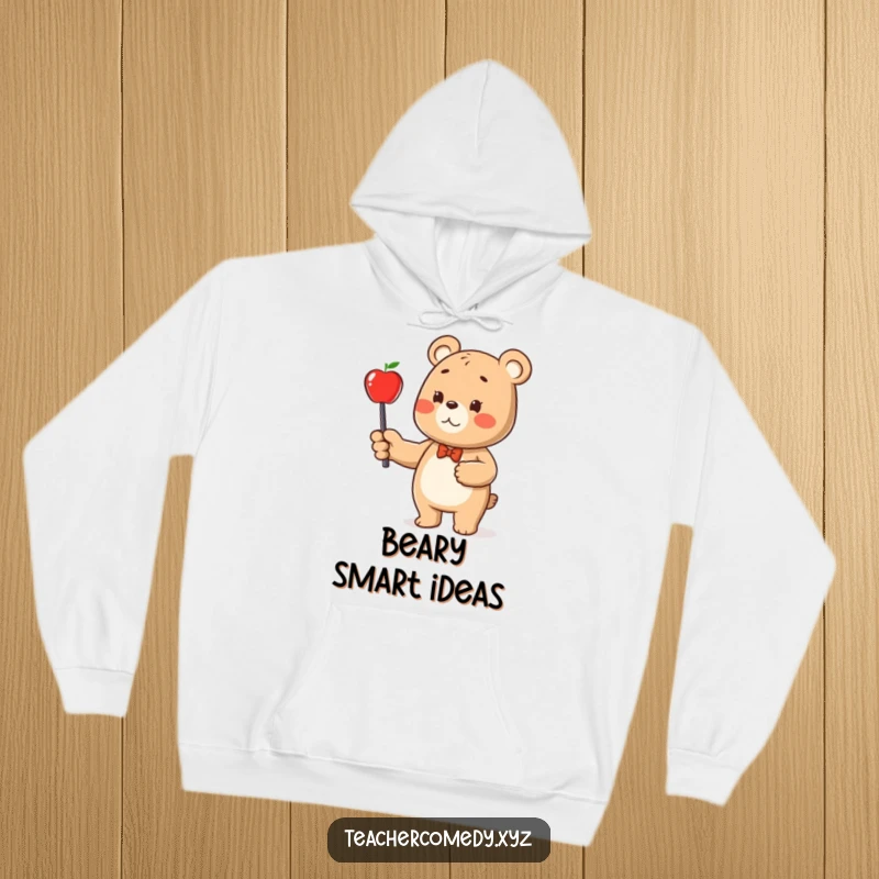 Funny bear character hoodie, a happy bear pointing a stick at an apple, conveying knowledge and warmth.