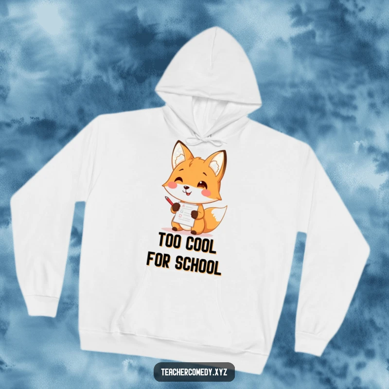 Funny hoodie with a cute fox character actively grading papers with a small red pen, radiating warmth and humor.