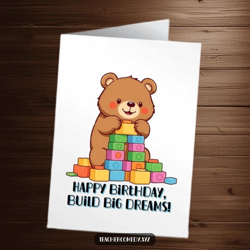 Funny Free Printable Birthday Card: Determined bear focused on stacking colorful building blocks high for a birthday surprise.